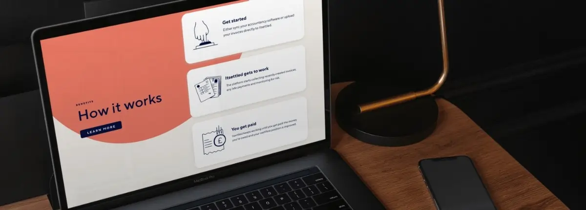 Itsettled Banner on Laptop