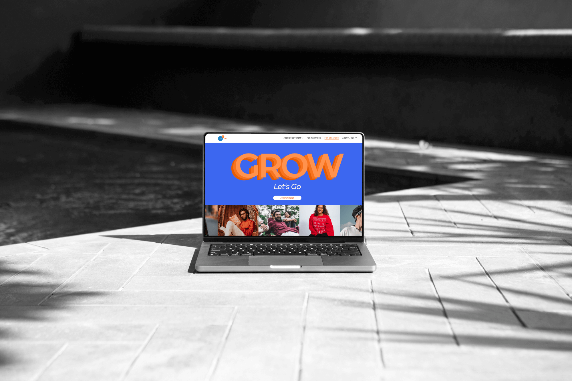 Josh Talks banner on laptop screen