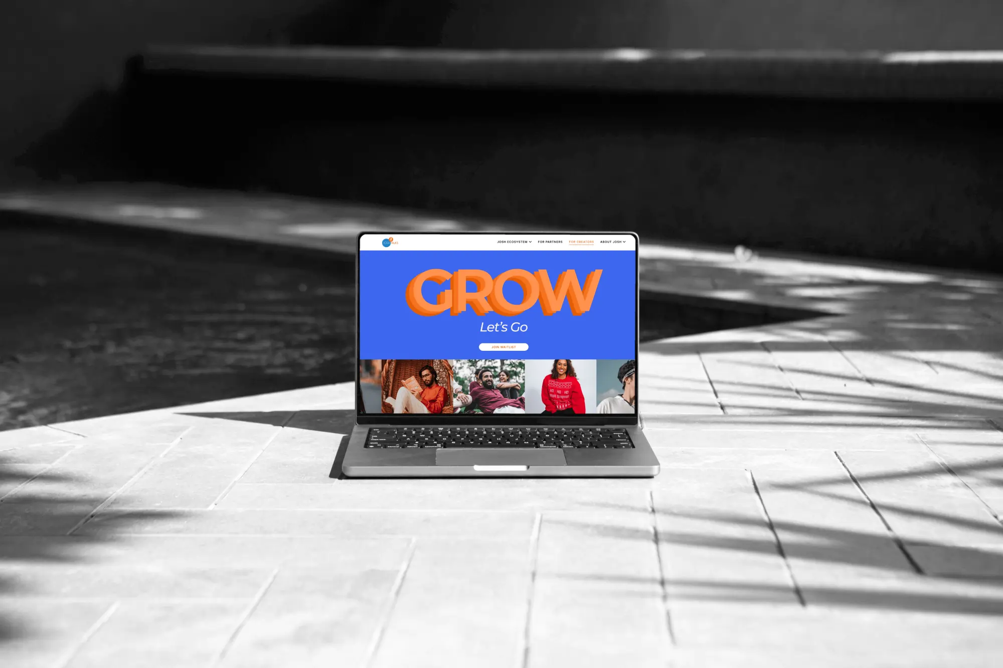 Josh Talks banner on laptop screen